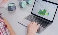 Meratch sensors beside a laptop showing the dashboard